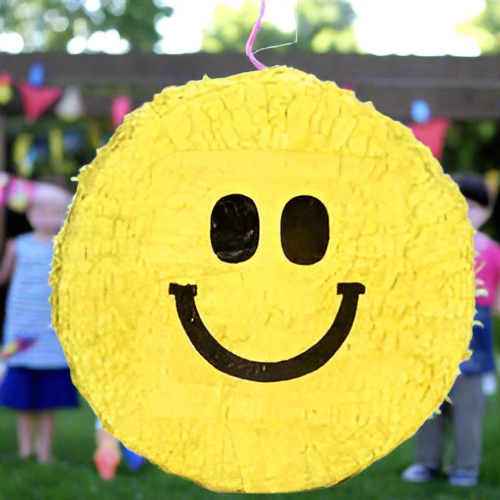 Yellow smiley face pinata
